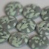 21 mm – 9 vnt. pilkos sagos su žalsvu, augalinių motyvų ornamentu 