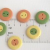22 mm - 6 vnt. žalios, geltonos ir oranžinės spalvos sagos „Trys spalvos“ (BT316)