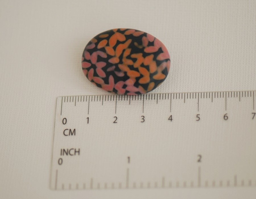 Ovali sagė „Žiedlapių byrėjimas“ (pin13)